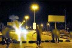 بحرينيون يضرمون النار على جسر الملك فهد لمنع دخول السعوديين