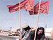 پایین کشیدن پرچم های عزاداری امام حسین علیه السلام توسط طالبان